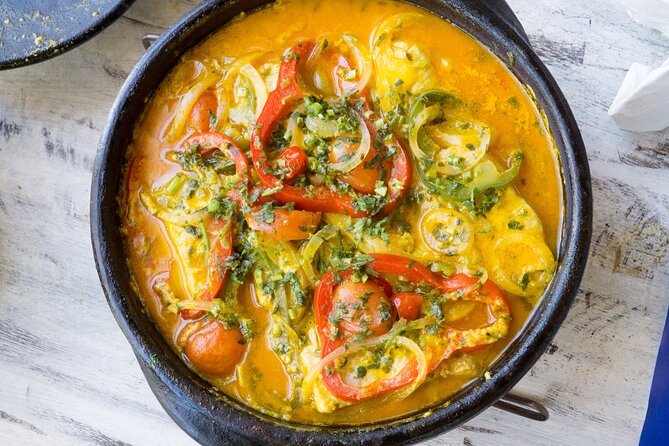 4h Cooking Class in Florianopolis: 8 Recipes & Bottomless Drinks - Preparing moqueca, the class centerpiece