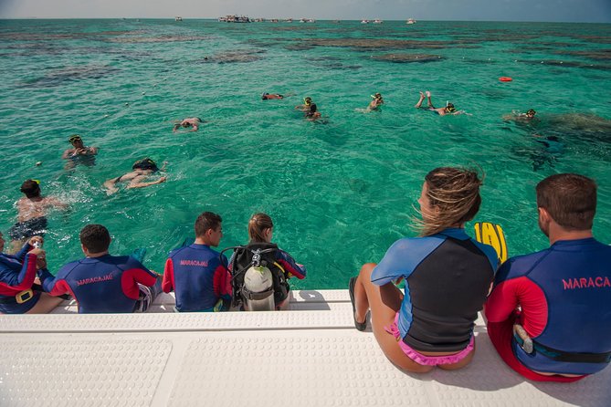 Discover Underwater Beauty: Explore Maracajaú's Parrachos Reef - Practical preparation for sun, water, and changing tides
