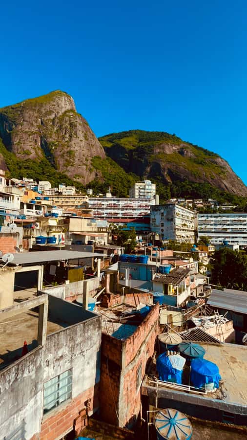 Hike Dois Irmãos + Vidigal Favela Experience - Walking back through Vidigal