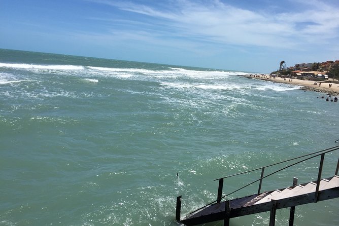 Morro Branco Beach - A beach day with tents, food, and warm water