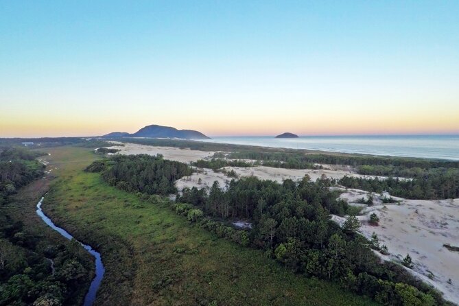 Mozambique Beach in Two Roads, Bike Tour - Following the most preserved part of Lagoa da Conceição