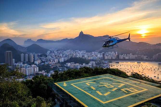 Private Helicopter Flight Tour: Rio de Janeiro Landmarks - Joatinga and Pedra da Gávea: small shore, huge rock