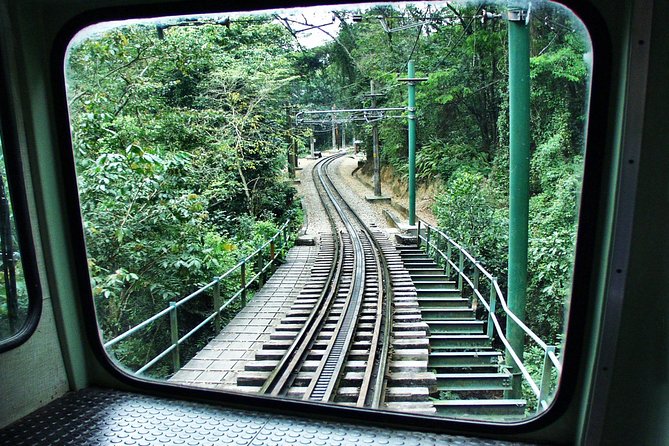 Skip The Line to Christ Redeemer By Train with Maracanã Stadium - The Cosme Velho station and the mountain train