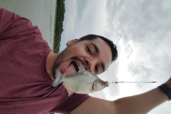 Solimoes River Piranha Fishing and Alligator Watching Tour - Piranha fishing near Iranduba