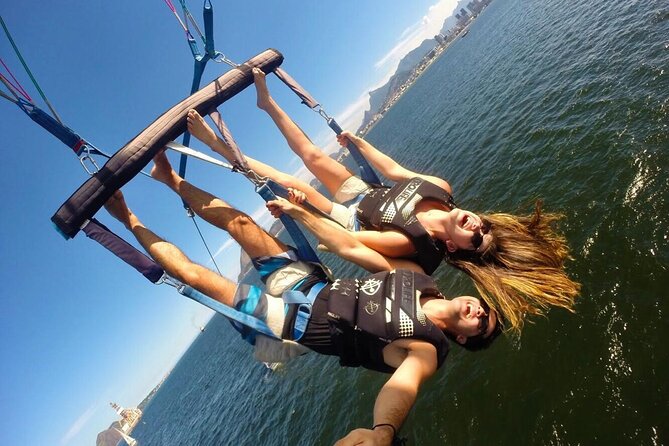 Speedboat Tour with Parasailing in Rio de Janeiro - Getting fitted with the harness and life vest