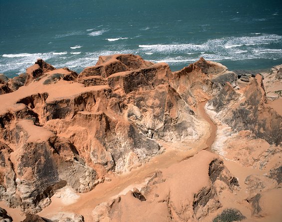 The colorful sands of Morro Branco beach - Full Day Tour - Why Morro Branco Is Worth the Long Day