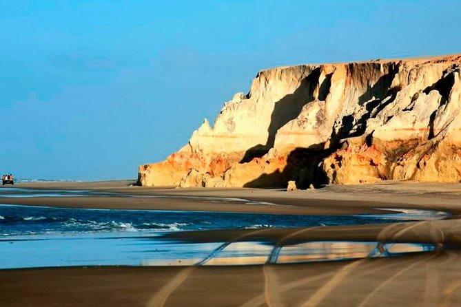 The colorful sands of Morro Branco beach - Full Day Tour - Beach Time, Swimming, and Local Food