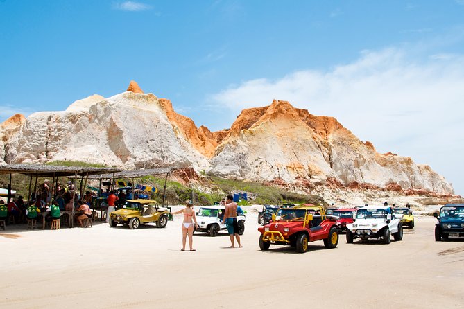 The colorful sands of Morro Branco beach - Full Day Tour - The Traditional Jaganda and Coastal Grottos